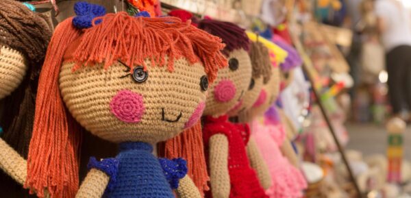 Knitted dolls in a shop