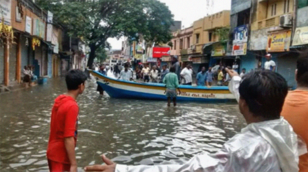 The scene in the street outside Dr Solomon’s Chennai clinic during the floods which disrupted the study